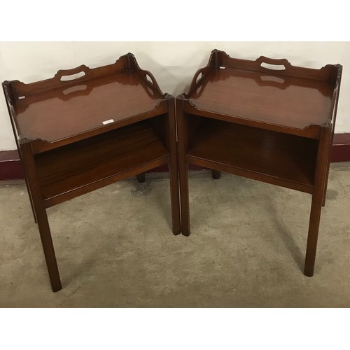 131 - A pair of George III style mahogany night stands