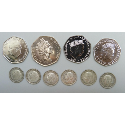 7212 - George V silver 3D set of coins, 1931-1936 (No 33) with four 50p including 1994 aircraft, Queen Eliz... 