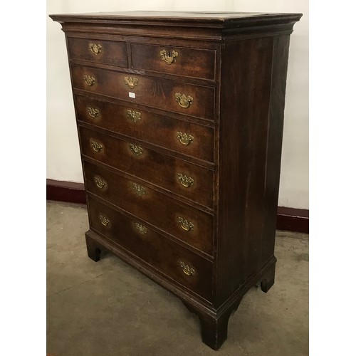 132 - A George III oak chest of drawers