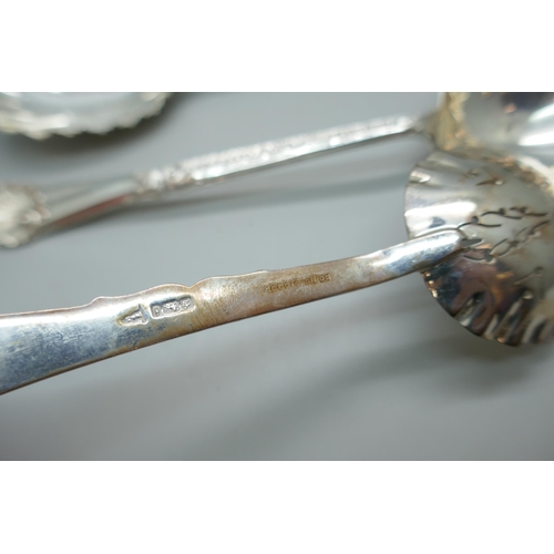 7244 - A pair of silver Walker & Hall serving spoons and a matching strainer spoon, Sheffield 1901, 248g to... 