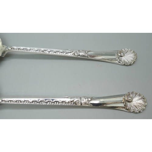 7244 - A pair of silver Walker & Hall serving spoons and a matching strainer spoon, Sheffield 1901, 248g to... 