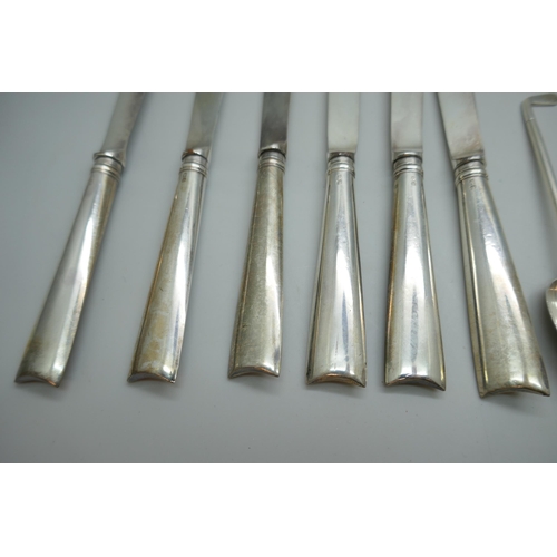 7246 - Two sets of silver spoons including four Walker & Hall golf spoons, 127g, and a set of silver handle... 