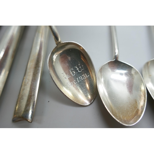 7246 - Two sets of silver spoons including four Walker & Hall golf spoons, 127g, and a set of silver handle... 