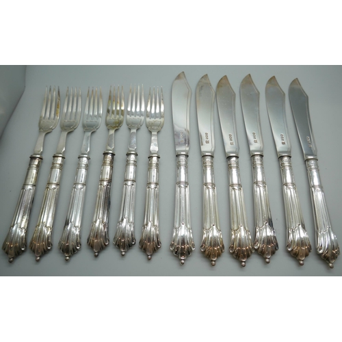 7254 - A canteen of silver fish knives and forks with silver blades and handles, James Deakin & Sons, Sheff... 