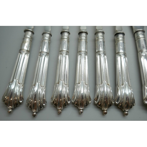 7254 - A canteen of silver fish knives and forks with silver blades and handles, James Deakin & Sons, Sheff... 