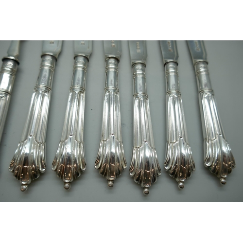 7254 - A canteen of silver fish knives and forks with silver blades and handles, James Deakin & Sons, Sheff... 