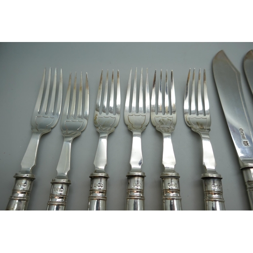 7254 - A canteen of silver fish knives and forks with silver blades and handles, James Deakin & Sons, Sheff... 