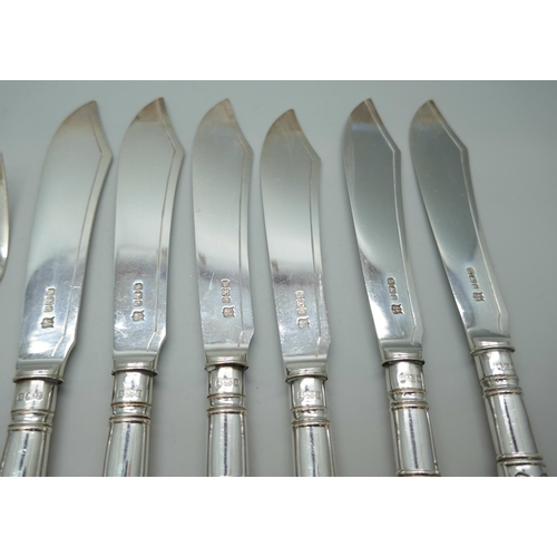 7254 - A canteen of silver fish knives and forks with silver blades and handles, James Deakin & Sons, Sheff... 