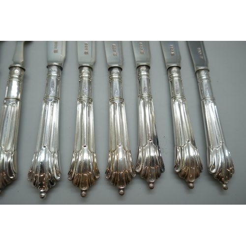 7254 - A canteen of silver fish knives and forks with silver blades and handles, James Deakin & Sons, Sheff... 