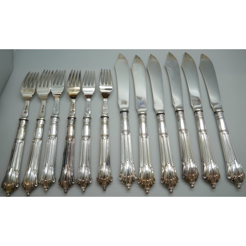 7254 - A canteen of silver fish knives and forks with silver blades and handles, James Deakin & Sons, Sheff... 