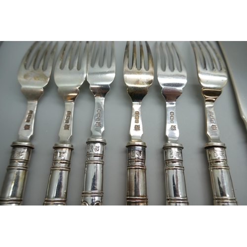 7254 - A canteen of silver fish knives and forks with silver blades and handles, James Deakin & Sons, Sheff... 