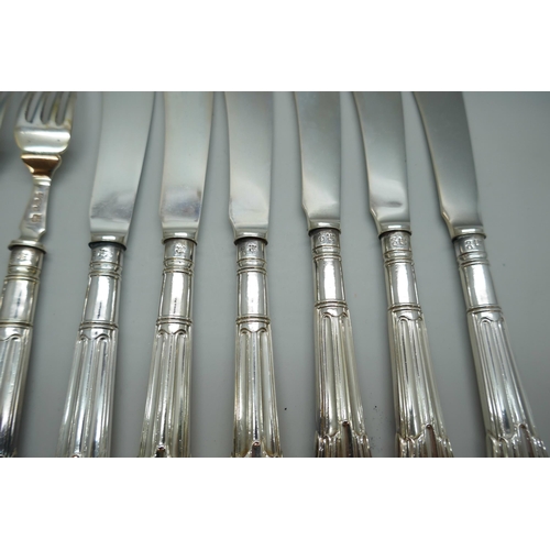 7254 - A canteen of silver fish knives and forks with silver blades and handles, James Deakin & Sons, Sheff... 