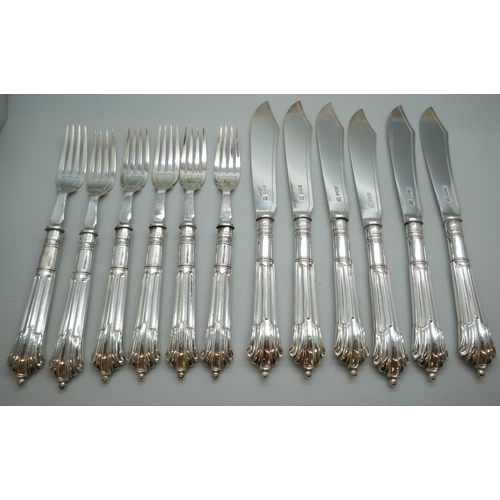 7254 - A canteen of silver fish knives and forks with silver blades and handles, James Deakin & Sons, Sheff... 