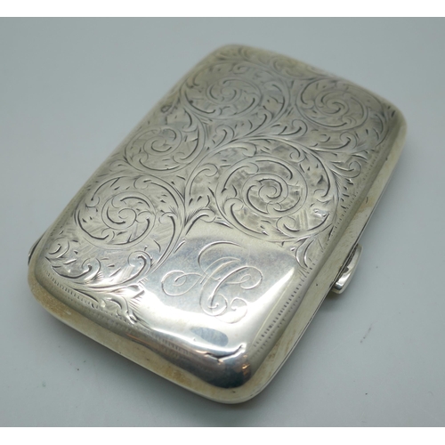 7258 - A silver cigarette case with monogram, 54g, 7.4 x 4.8cm