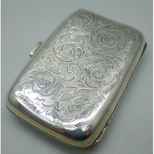 7258 - A silver cigarette case with monogram, 54g, 7.4 x 4.8cm