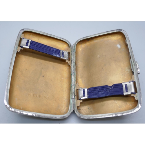 7258 - A silver cigarette case with monogram, 54g, 7.4 x 4.8cm