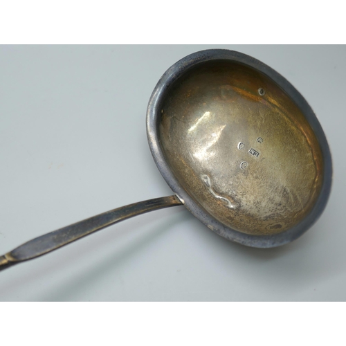 7263 - A Georgian silver toddy ladle with baleen handle, date letter worn