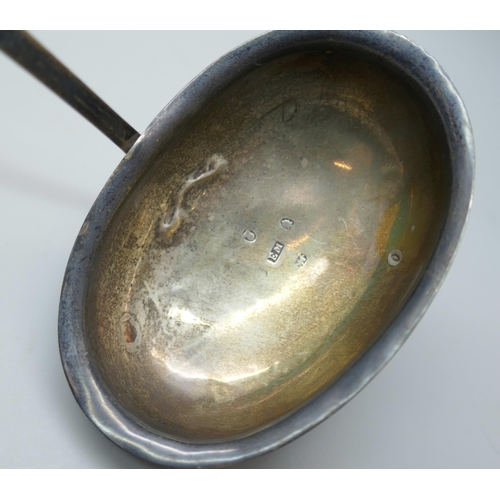 7263 - A Georgian silver toddy ladle with baleen handle, date letter worn