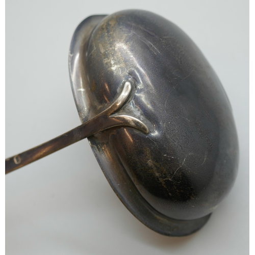 7263 - A Georgian silver toddy ladle with baleen handle, date letter worn