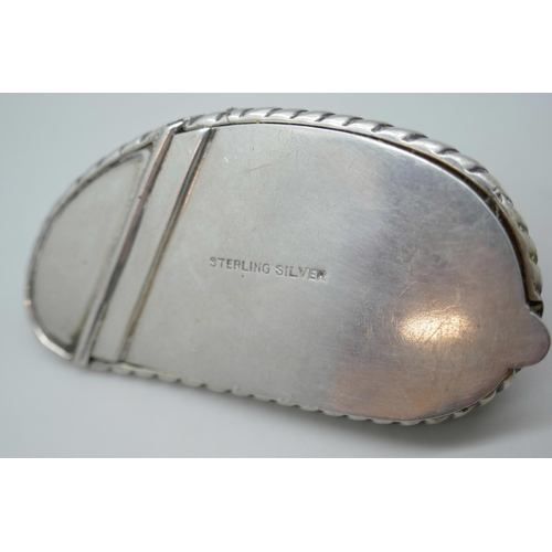 7266 - A silver mounted snuff box, stamped 'sterling silver', 61g, 7.3cm