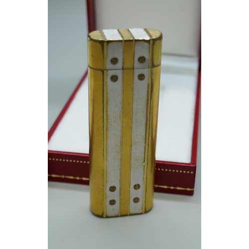 7268 - A Must De Cartier gold plated lighter, boxed, together with two empty Cartier boxes