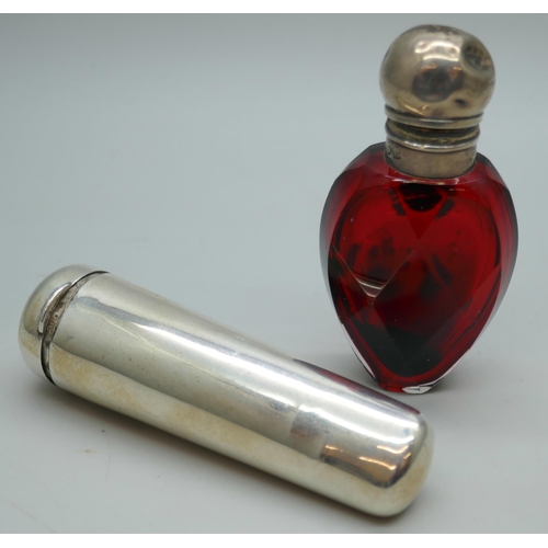 7271 - A silver cheroot case, 19g, and a silver topped glass scent bottle