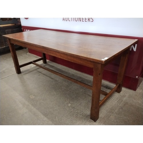 164 - An Arts and Crafts oak refectory table