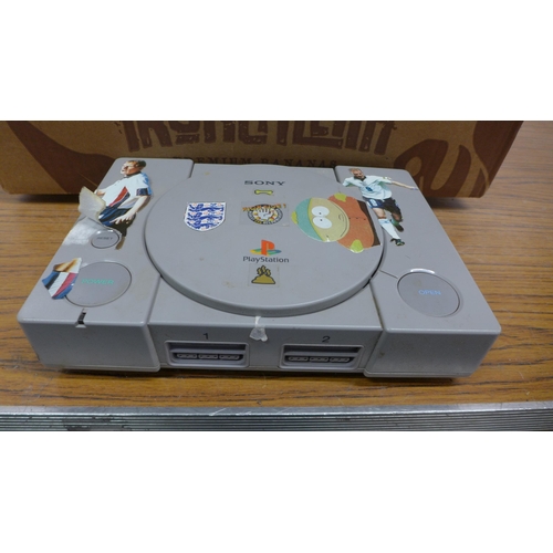 5090 - A quantity of PlayStation gaming equipment including an original PlayStation games console  with an ... 