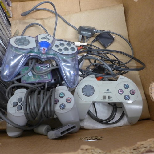 5090 - A quantity of PlayStation gaming equipment including an original PlayStation games console  with an ... 