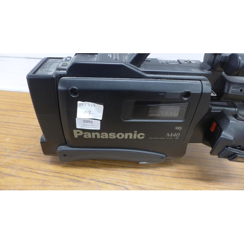 5092 - A Panasonic M40 VHS NV-M40 HQ movie camera with tripod on casters