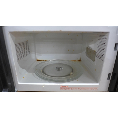 5105 - A Breville 1200w microwave oven