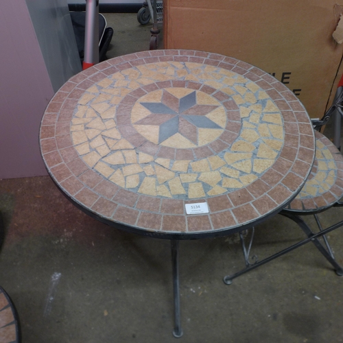 5134 - A folding metal bistro style garden table with  tiled mosaic table top and seat tops