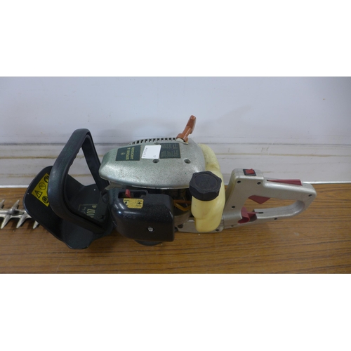 5154A - A Spear and Jackson petrol driven hedge cutter and an Alpina petrol driven chainsaw *This lot is a P... 