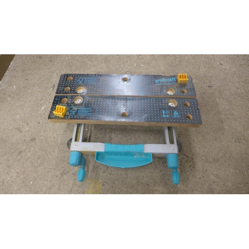 5165 - Three assorted folding work benches and a bench mounting work bench