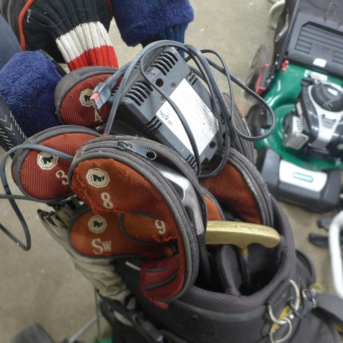 5168 - A Power Caddy golf bag with a selection of five full ball golf clubs and Power Caddy electric golf c... 