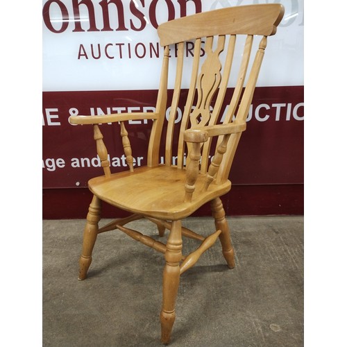 168 - A Victorian style beech farmhouse chair