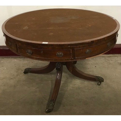 139 - A George IV mahogany drum shaped library table