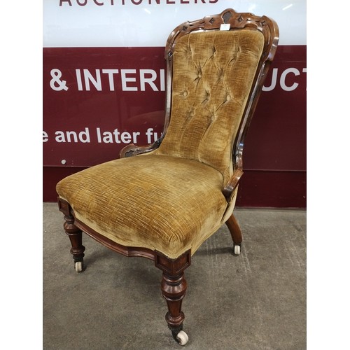 172 - A Victorian carved walnut and fabric upholstered lady's chair