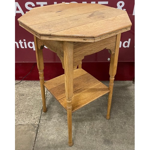 170A - An Arts and Crafts Liberty & Co. style oak octagonal occasional table