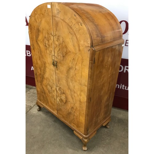 193 - An Art Deco figured walnut tallboy