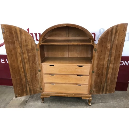 193 - An Art Deco figured walnut tallboy