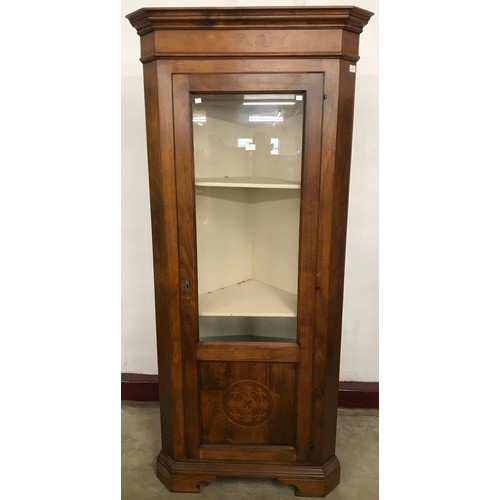 194 - A French style inlaid hardwood freestanding corner cabinet