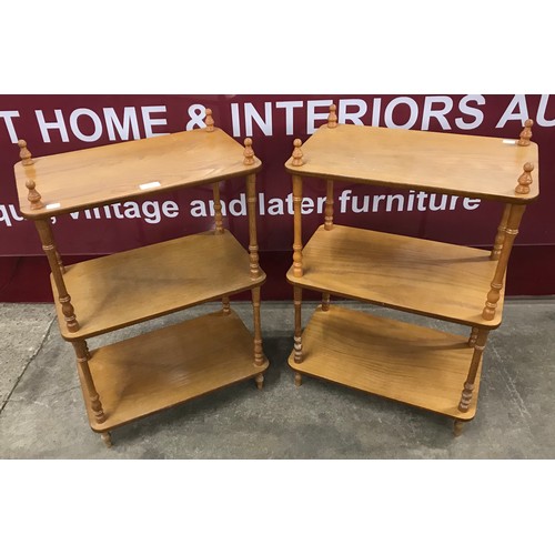 198 - A pair of French style oak three tier etageres