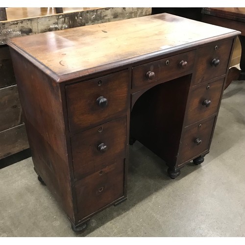 201 - A Victorian mahogany kneehole desk