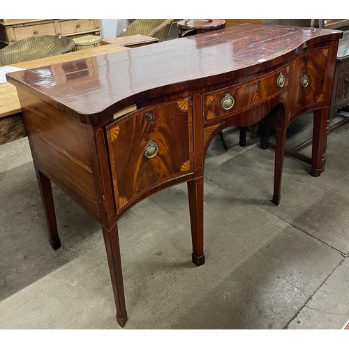 221 - A Regency inlaid mahogany serpentine sideboard