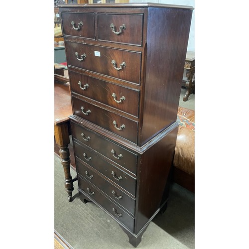 253 - A George III style mahogany chest on chest