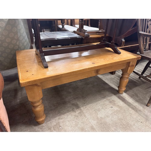 268 - A mahogany drop leaf coffee table, a stool and a pine coffee table