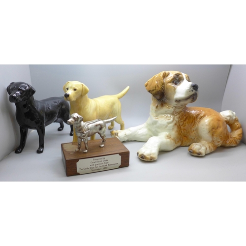 2025 - Two Beswick model labradors, black and golden, a large Goebel model of a puppy and a Guide Dogs for ... 