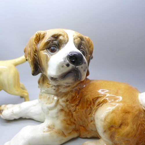 2025 - Two Beswick model labradors, black and golden, a large Goebel model of a puppy and a Guide Dogs for ... 