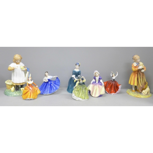 2061 - Eight Royal Doulton figures; two Age of Innocence series, Puppy Love and Feeding Time, and six small... 